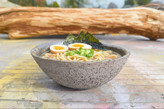 Nand - grove zwarte bowl met groene afwerking