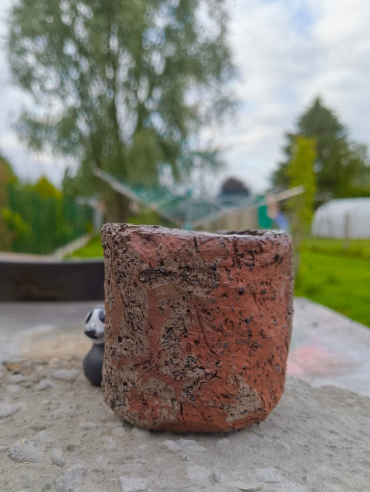 Gregory - zware pot in rode klei